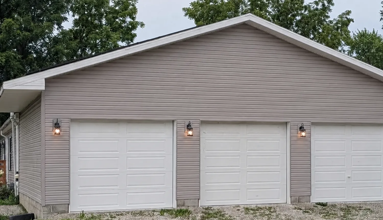 Three-car garage built by Wrenfield Custom Builders